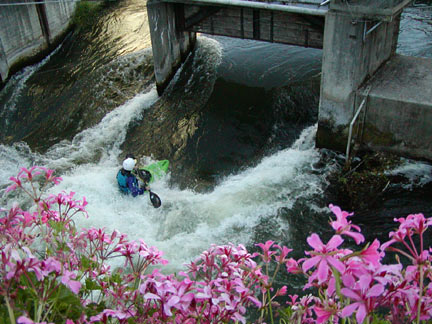 kayak under bridge