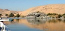 view from felucca2 * The ride on the felucca is one of peace and calm, as you lazily glide long.  The dry sand hills provide a stark contrast to the cool blue water. * 432 x 212 * (37KB)