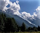 mont blanc * Taken from the main highway entering Chamonix in the late afternoon as the clouds were beginning to gather over the mountain.  An hour later, the skies opened with a fierce rain shower (as we sat dry, eating our pizza and drinking beer). * 432 x 360 * (53KB)