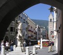 fountain from arcade * A view of the main street of Sterzing (Vipiteno) and statue from the arcade.  Sterzing is an old medieval arcaded town.  Lots of shops, restaurants and eis cafes.      * 362 x 323 * (55KB)