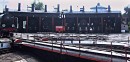 turntable and engine barn * The huge turntable in the foreground is used to turn around the engines.  In the background is the 